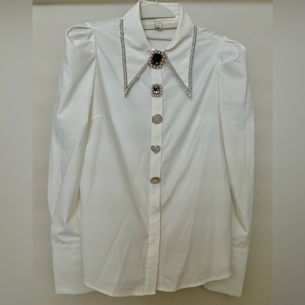 Beautiful and unique women’s shirt decorated with beads